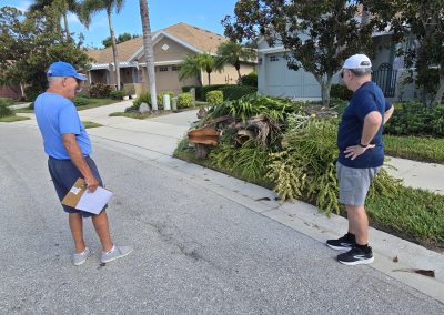 Stan and Larry review the results of trimming at one villa