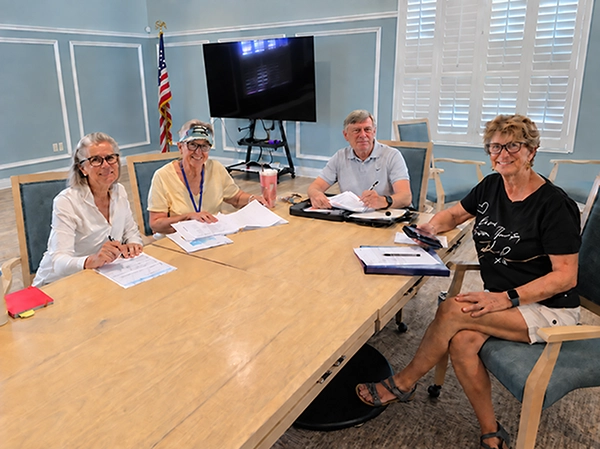 Stan Brown Palma Sola Trace Villas HOA president with ACC staff